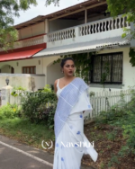Sundar Mala - Elegant White Saree with Striped Pattern & Tiny Flower Motifs with Blouse Piece - Image 2