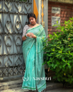 Hari Mala - Elegant Bottle Green Saree with Flower Motifs and Small Patti Border & Blouse Piece